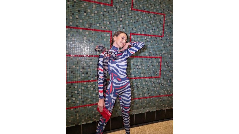 Michelle Keegan wearing a striped catsuit on Instagram