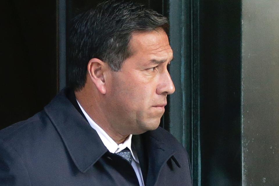 In this March 25, 2019 file photo Jorge Salcedo, former University of California at Los Angeles men's soccer coach, departs federal court in Boston, after facing charges in a nationwide college admissions bribery scandal.