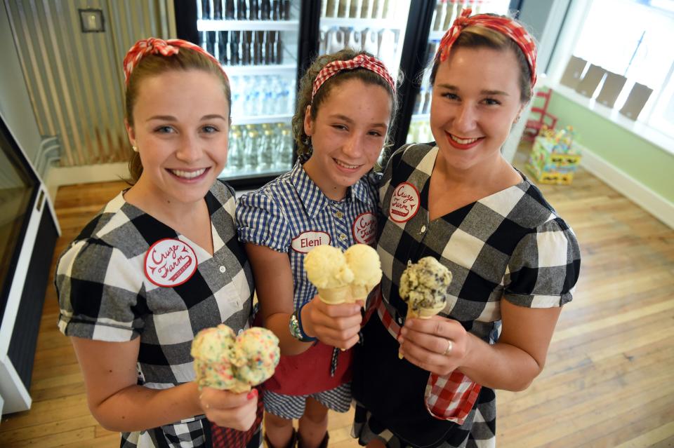 Employees Erin Allen, Eleni Christopoulos, and Katie King at a Cruze Farm pop up shop on Union Avenue in downtown Knoxville in 2016.