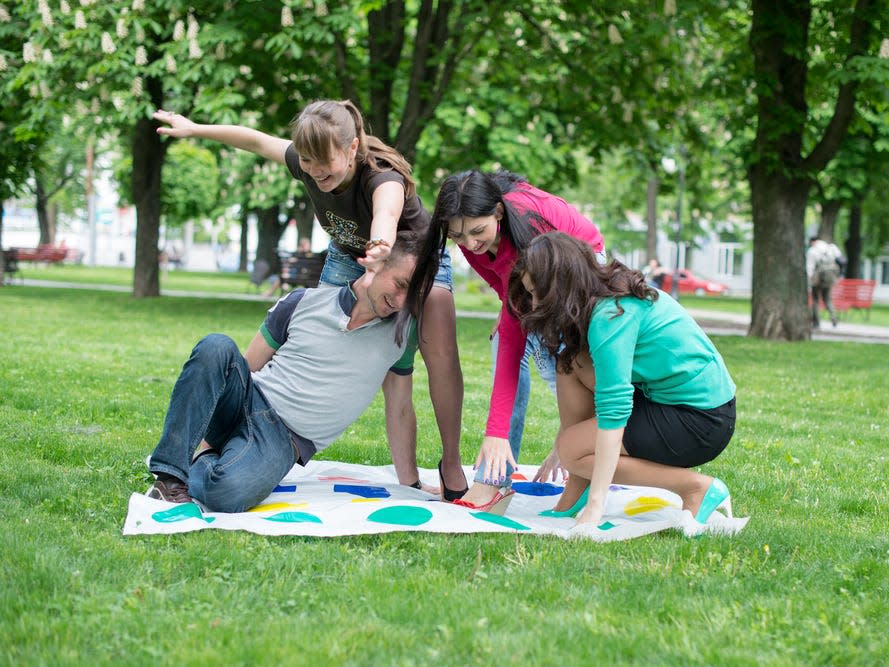 People playing Twister.