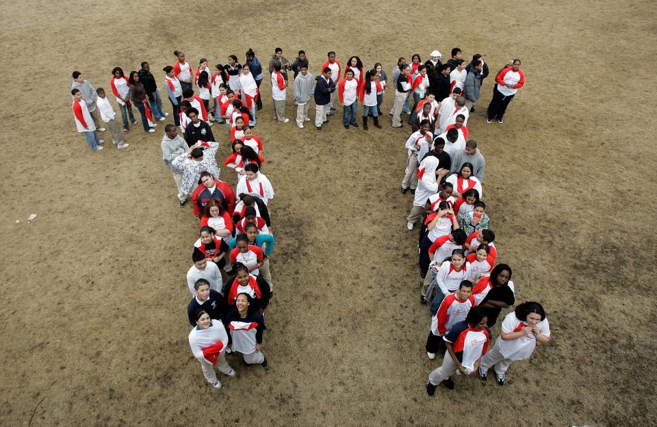 Students from the Maurice J. Tobin School makes a human Pi symbol at the school in Boston during a celebration of Pi Day in 2007.