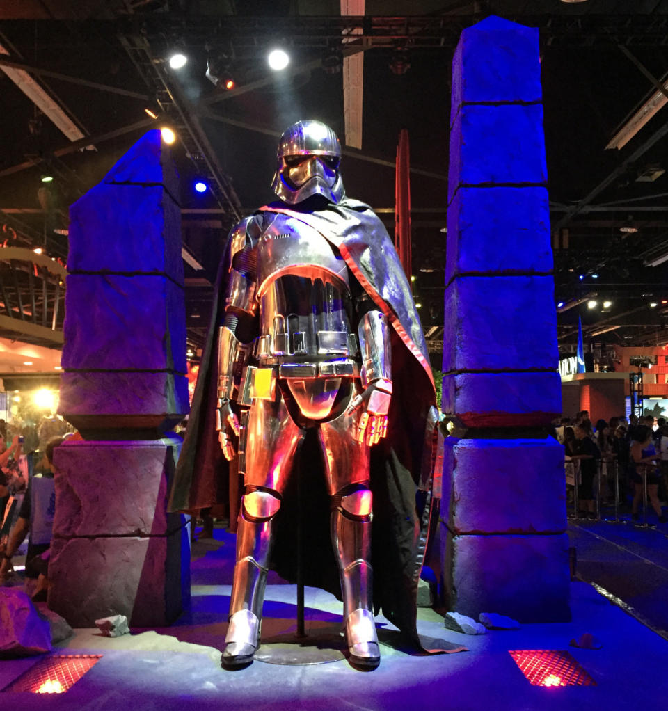 The female Stormtrooper, played by Gwendoline Christie, wears this chromed-out armor, seen in detail for the first time. For the DIYers, the various components of the costume range from a 3D-printed nylon helmet, canvas cape, molded polyurethane armor, cotton lycra undersuit and gussets, and leather gloves and boots, all polished up to First Order specs.