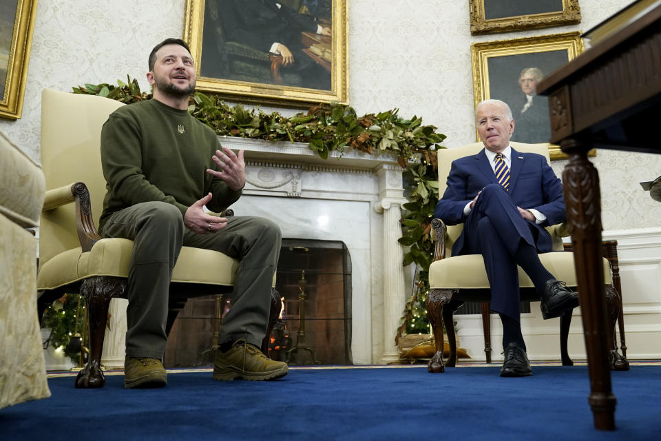 Ukrainian President Volodymyr Zelenskyy speaks during a meeting with President Joe Biden in the Oval Office of the White House, Wednesday, Dec. 21, 2022, in Washington. (AP Photo/Patrick Semansky)