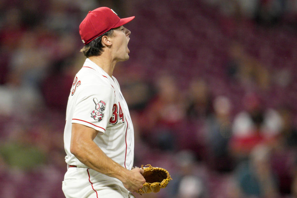 Cincinnati Reds starting pitcher Connor Phillips reacts after striking out Minnesota Twins' Christian Vazquez in the seventh inning of a baseball game in Cincinnati, Monday, Sept. 18, 2023. (AP Photo/Jeff Dean)