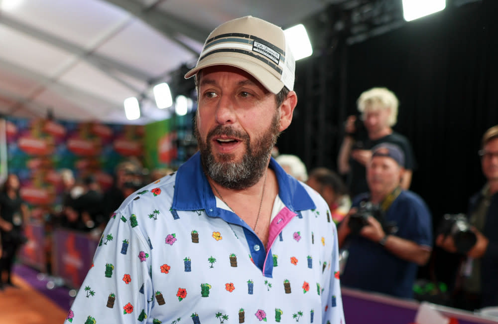 Adam Sandler gets mocked by his family for his 'goofy' style credit:Bang Showbiz