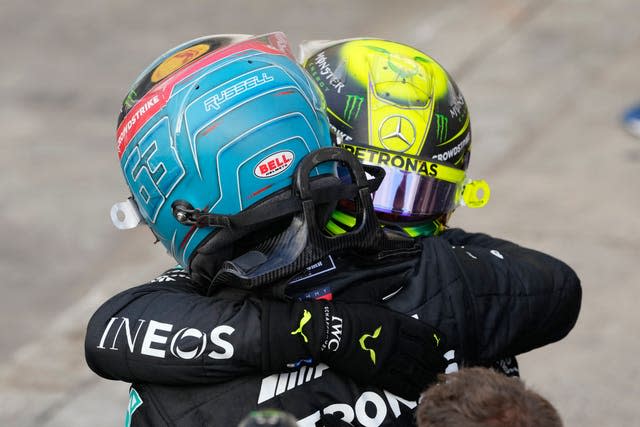 Lewis Hamilton and George Russell embrace 