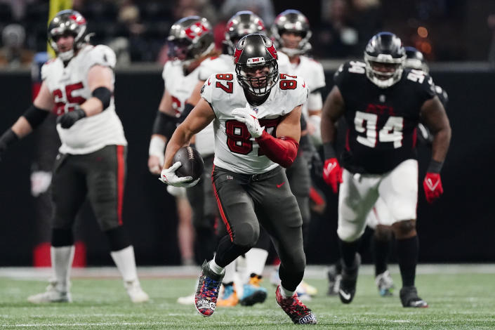 Tampa Bay Buccaneers tight end Rob Gronkowski (87) runs against the Atlanta Falcons during the second half of an NFL football game, Sunday, Dec. 5, 2021, in Atlanta. (AP Photo/John Bazemore)
