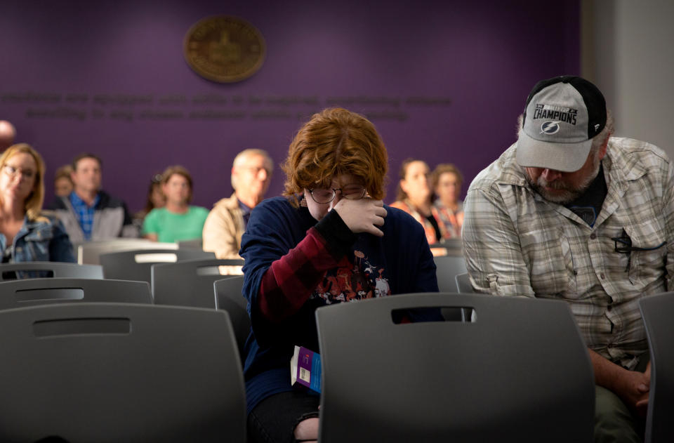 Image: Lou Whiting, a junior at Granbury High School, becomes emotional after speaking about the removal of books from GISD schools at a school board meeting on March 21, 2022. (Shelby Tauber for ProPublica, The Texas Tribune, NBC News)