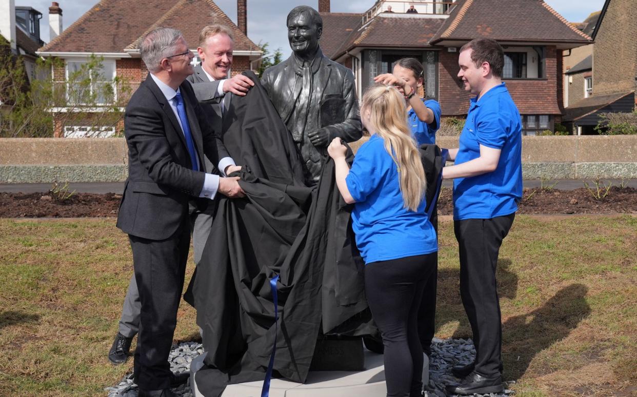 Andrew Rosindell (left) with members of the Music Man Project unveil a statue of murdered MP Sir David Amess