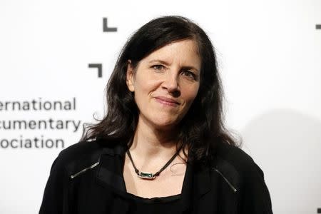 Director Laura Poitras of the best feature award nominee "Citizenfour" poses at the International Documentary Association's 2014 IDA Documentary Awards in Los Angeles December 5, 2014. REUTERS/Danny Moloshok