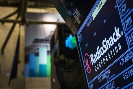 The ticker for RadioShack Corp. is seen at the post where it's traded just after the opening bell on the floor of the New York Stock Exchange March 4, 2014. REUTERS/Brendan McDermid
