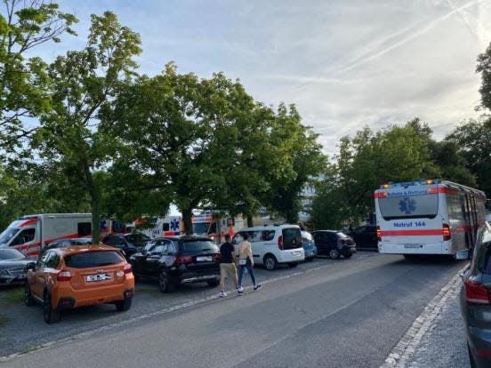 Emergency personnel scene in Switzerland after people at a corporate retreat walk on hot coals