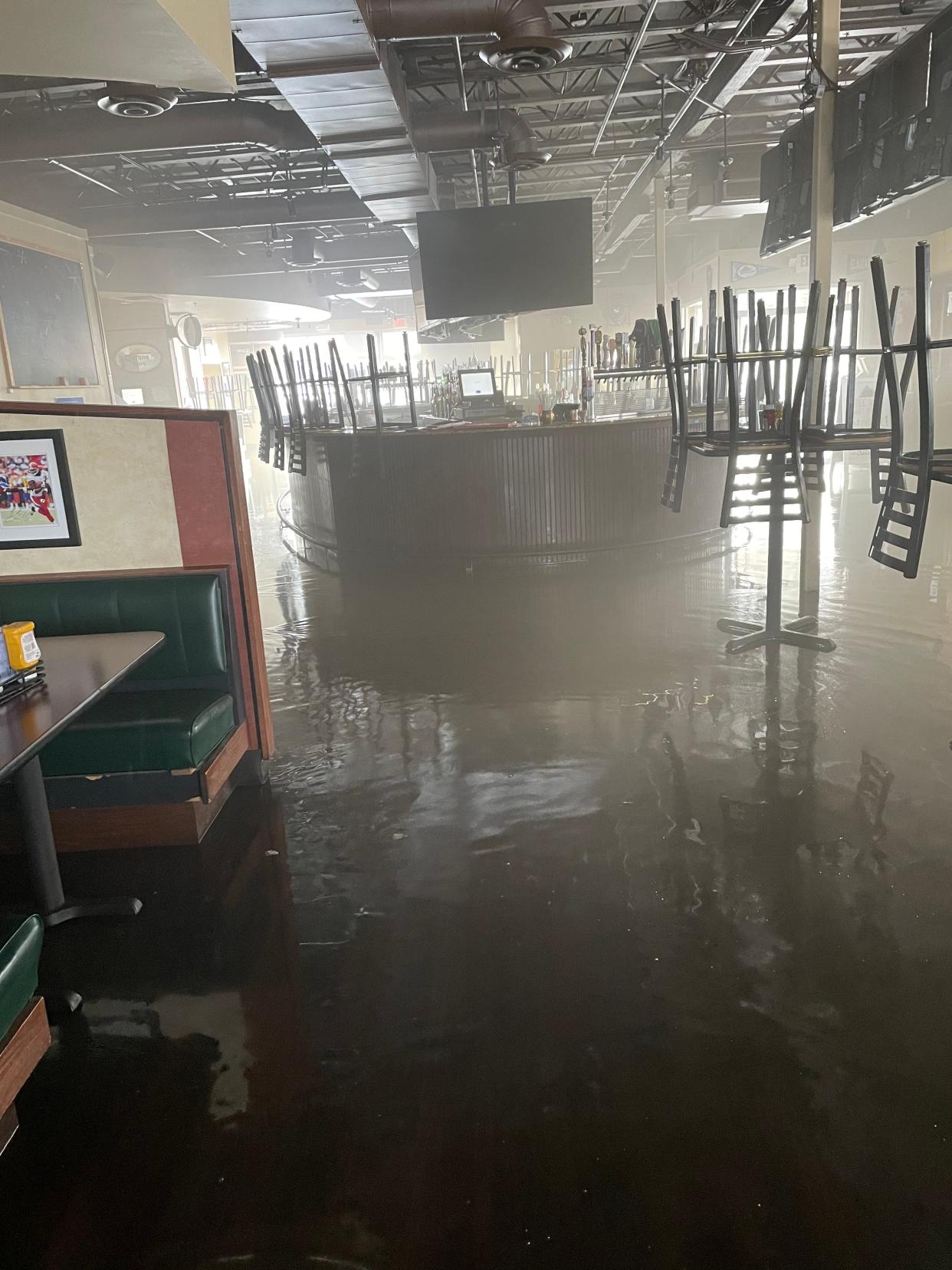 Although a fire at the Happy Moose Bar and Grill on Route 14 in Streetsboro on Friday morning was confined to the kitchen, there was also smoke and water damage throughout the restaurant, including here in the main dining area. Damages are estimated to total more than $250,000.