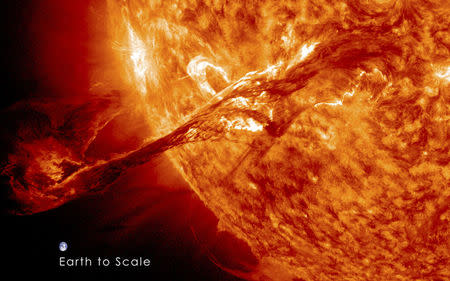 A long filament of solar material that had been hovering in the Sun's atmosphere, the corona, erupts out into space. REUTERS/NASA/GSFC/SDO