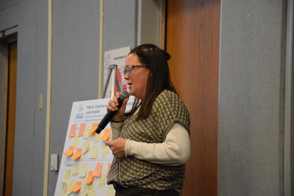 Lindsey Walker from Emmet County Recycling speaks during a public input session regarding the MI Healthy Climate Plan on Dec. 12, 2023 at North Central Michigan College.