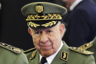 FILE - In this photo taken Thursday, Dec. 19, 2019, Algerian Gen. Said Chengriha attends president Abdelmajid Tebboune's inauguration ceremony in the presidential palace, in Algiers. Algeria's powerful military chief Gaid Salah died unexpectedly Monday, according to government media reports, leaving his country gripped by political uncertainty after 10 months of pro-democracy protests. Gaid Salah is being replaced on a temporary basis by another high-ranking general, Said Chengriha. (AP Photo/Fateh Guidoum, File)