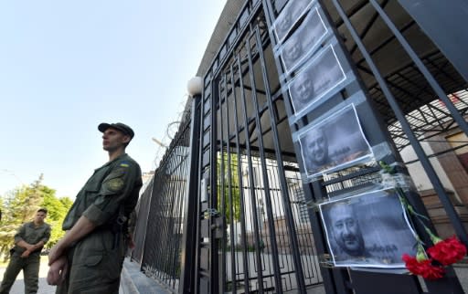 Flowers and pictures of anti-Kremlin journalist Arkadi Babchenko were left at the Russian embassy in Kiev after his reported death -- which Ukraine has since admitted was faked