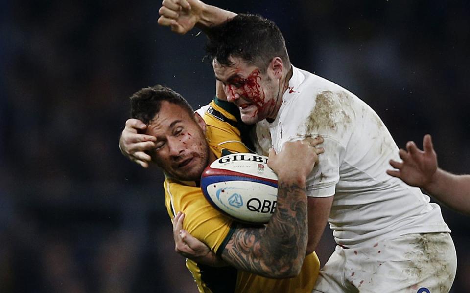 Brad Barritt smashes into Quade Cooper - AFP