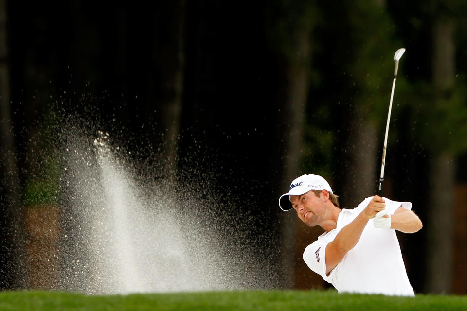 CHARLOTTE, NC - MAY 06: Webb Simpson of the United States hits an approach shot from a bunker on the first hole during the final round of the Wells Fargo Championship at the Quail Hollow Club on May 6, 2012 in Charlotte, North Carolina. (Photo by Streeter Lecka/Getty Images)