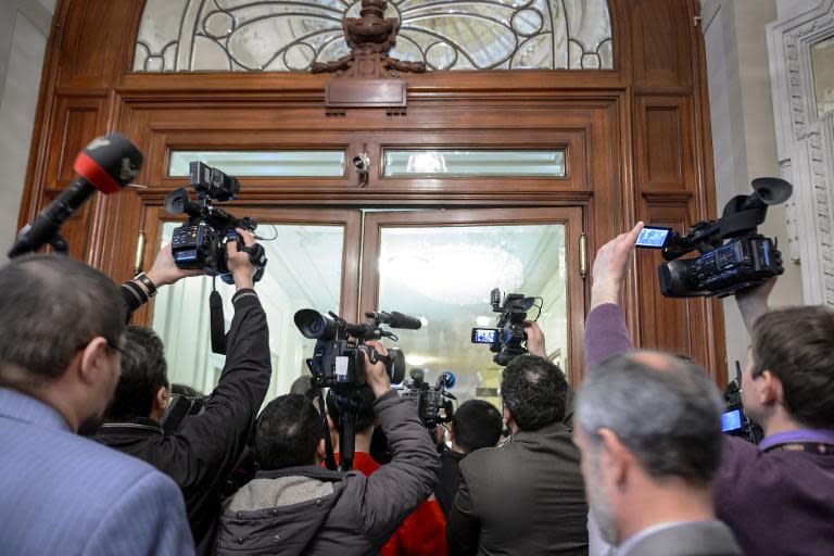 TV journalists rush in the hotel on March 29, 2015 during Iran nuclear talks in Lausanne