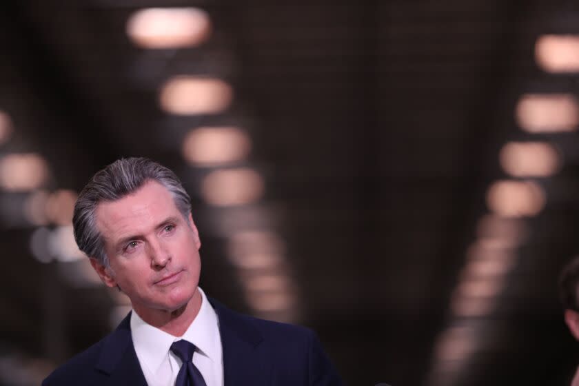 Fontana, CA - February 17: Fontana, CA - February 17: Governor Gavin Newsom speaks at a press conference to unveil the next phase of California's pandemic response in the UPS Healthcare warehouse filled with personal protective equipment in Fontana Thursday, Feb. 17, 2022. (Allen J. Schaben / Los Angeles Times)