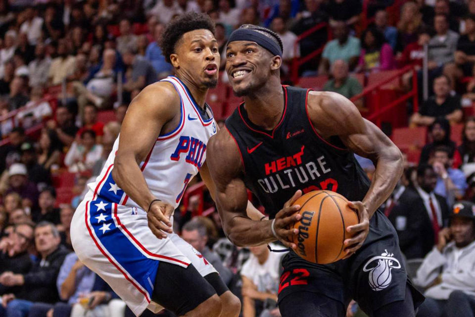 Miami Heat forward Jimmy Butler (22) drives past Philadelphia 76ers guard Kyle Lowry (7) during the first half at Kaseya Center in Miami on Thursday, April 4, 2024. (D.A. Varela/Miami Herald/Tribune News Service via Getty Images)