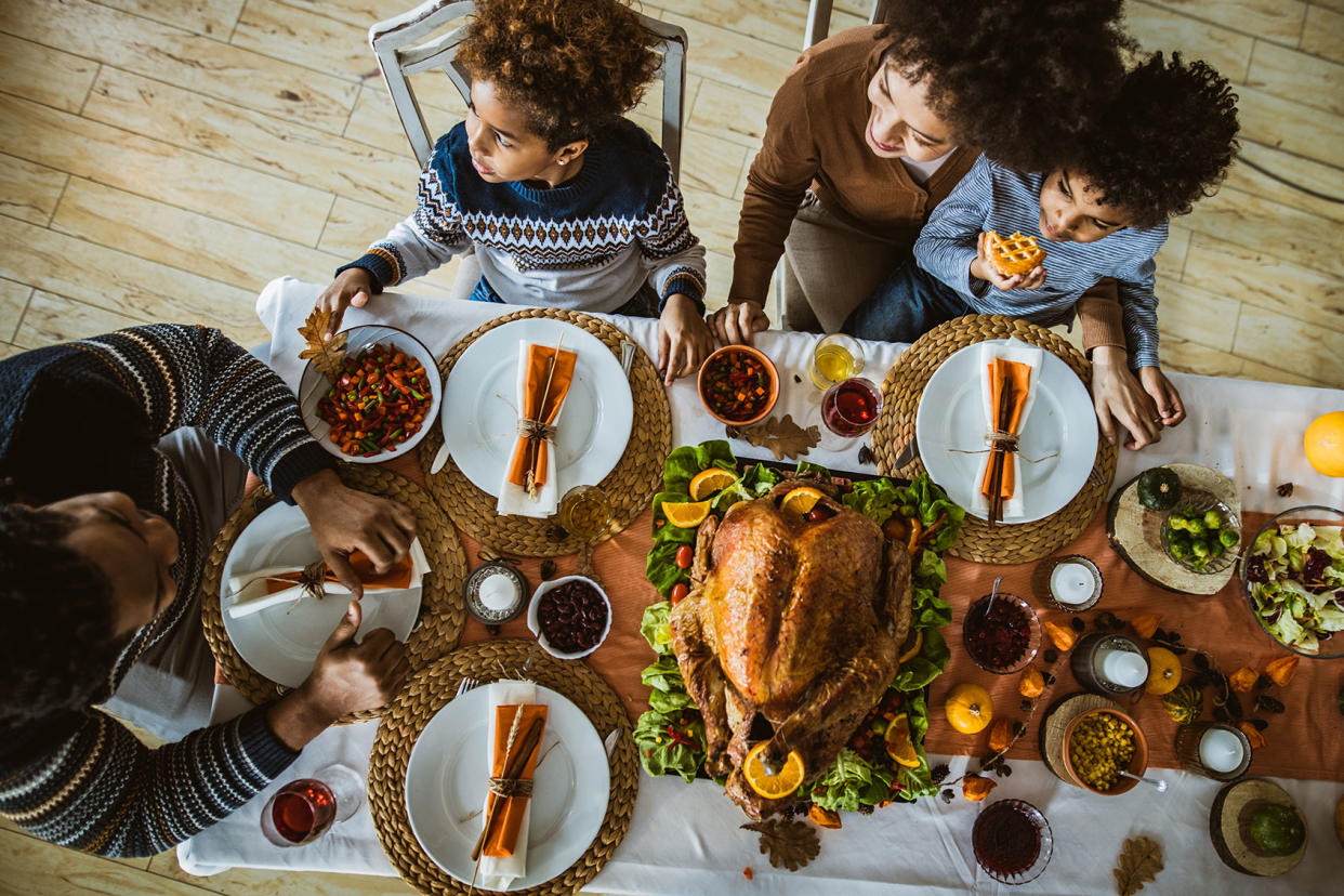 family thanksgiving meal Getty Images/skynesher