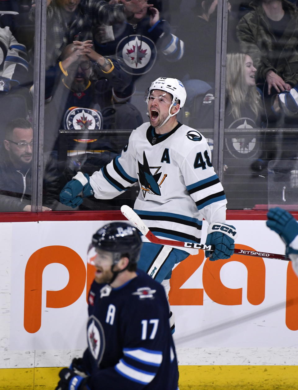 San Jose Sharks' Tomas Hertl (48) celebrates after his goal against the Winnipeg Jets during third-period NHL hockey game action in Winnipeg, Manitoba, Monday, March 6, 2023. (Fred Greenslade/The Canadian Press via AP)