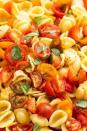 <p>This salad is the epitome of summer in a bowl.</p><p>Get the <a href="https://www.delish.com/uk/cooking/recipes/a32399230/bruschetta-pasta-salad-recipe/" rel="nofollow noopener" target="_blank" data-ylk="slk:Bruschetta Pasta Salad;elm:context_link;itc:0;sec:content-canvas" class="link ">Bruschetta Pasta Salad</a> recipe.</p>