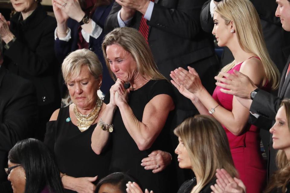 An emotional Carryn Owens, widow of widow of Chief Special Warfare Operator William “Ryan” Owens, on Capitol Hill in Washington, Tuesday, Feb. 28, 2017, as she was acknowledged by President Donald Trump during his address to a joint session of Congress. (AP Photo/Pablo Martinez Monsivais)