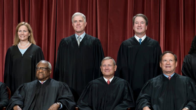 Conservative members of the Supreme Court are seen during a photo session at the Supreme Court building in Washington, Friday, Oct. 7, 2022. Top row, from left are: Associate Justice Amy Coney Barrett, Associate Justice Neil Gorsuch, and Associate Justice Brett Kavanaugh. Bottom row, from left are: Associate Justice Clarence Thomas, Chief Justice of the United States John Roberts, and Associate Justice Samuel Alito.