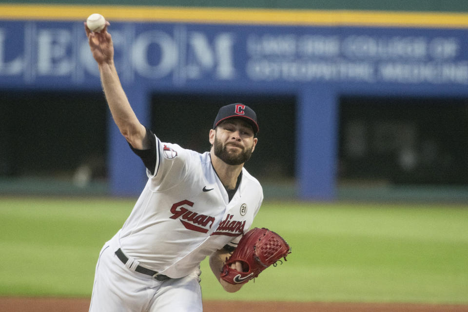 Cleveland Guardians starting pitcher Lucas Giolito delivers against the Texas Rangers during the first inning of a baseball game in Cleveland, Friday, Sept. 15, 2023. (AP Photo/Phil Long)