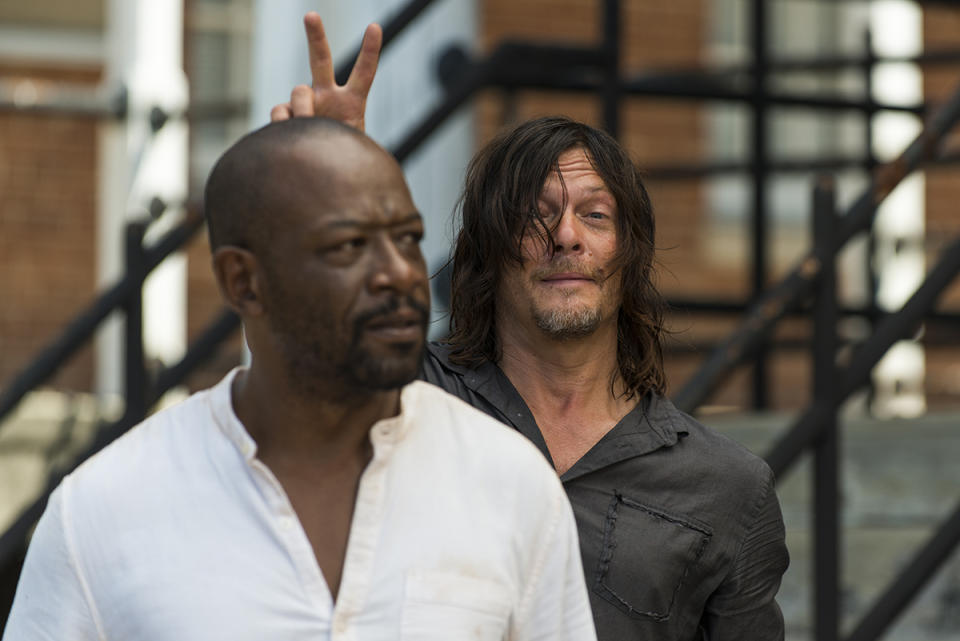 <p>While filming on the Kingdom set, Norman Reedus makes bunny ears on co-star Lennie James.<br><br>(Photo: AMC) </p>