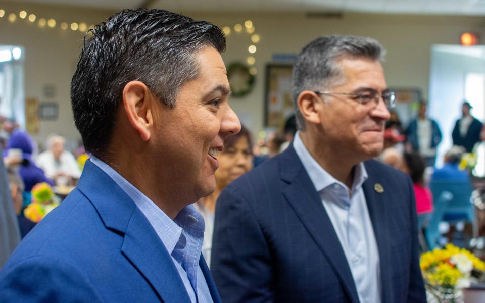 U.S. Rep. Raul Ruiz, left, and Health and Human Services Secretary Xavier Becerra at a vaccine drive Friday at the senior center in Desert Hot Springs.