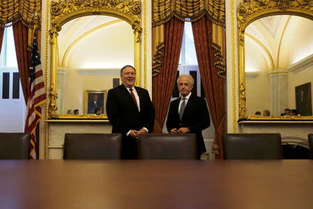 U.S. Senate Foreign Relations Committee Chairman Bob Corker (R-TN), R, meets with CIA Director Mike Pompeo, L, President Trump's nominee for Secretary of State, at the U.S. Capitol in Washington March 19, 2018. REUTERS/James Lawler Duggan