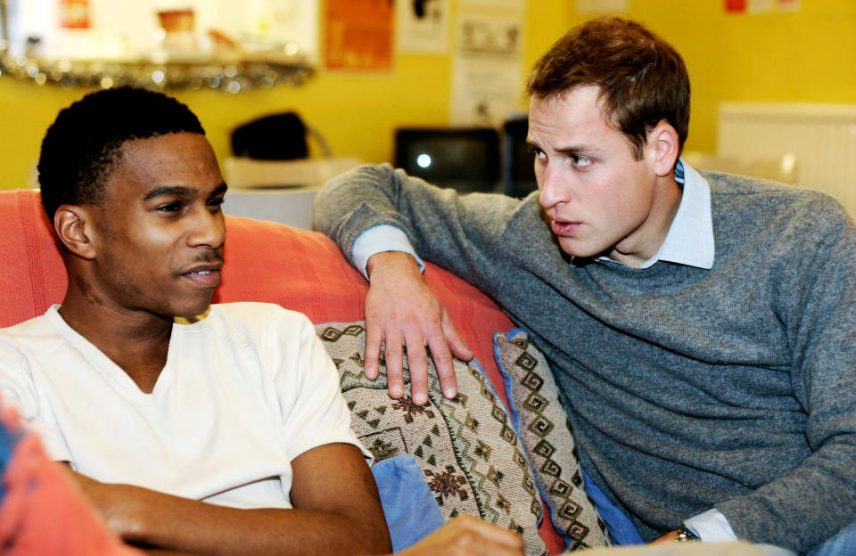 Caring Prince William talks with an ethinic young homeless person at a Centrepoint homeless hostel during his visit to the center. (Photo by © Pool Photograph/Corbis/Corbis via Getty Images)