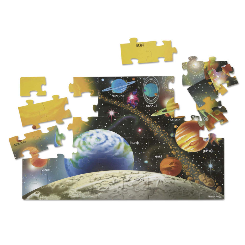 This image released by Melissa & Doug shows a 48-piece puzzle of the solar system. The sturdy, large pieces make this big floor jigsaw puzzle a fun one for the family to assemble. (Melissa & Doug via AP)