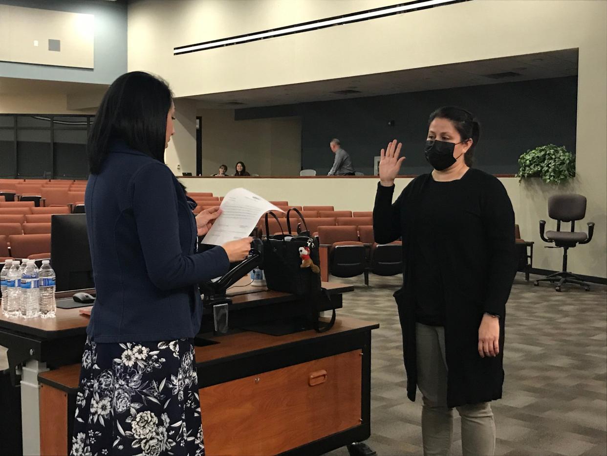 Gloria Solorio is sworn in by Avondale's city clerk as the new City Council member on Jan. 24, 2022, in the council chambers.