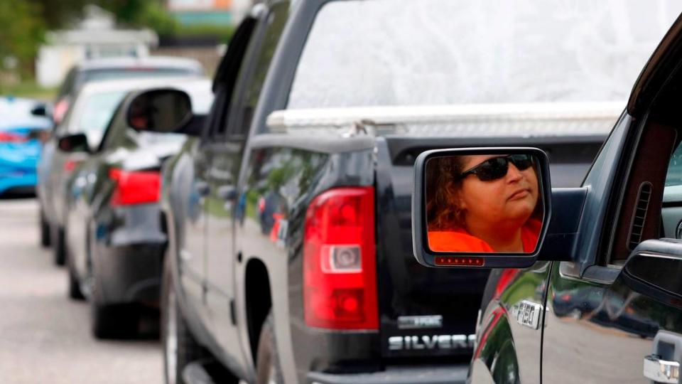 Glenda Wendt sits in her vehicle waiting in a long line to get gas at the Short Stop in Beulaville, N.C., Tuesday, May 11, 2021. Wendt said getting gas ëis not a must but I rather get it while there is some than (getting) none at all.î