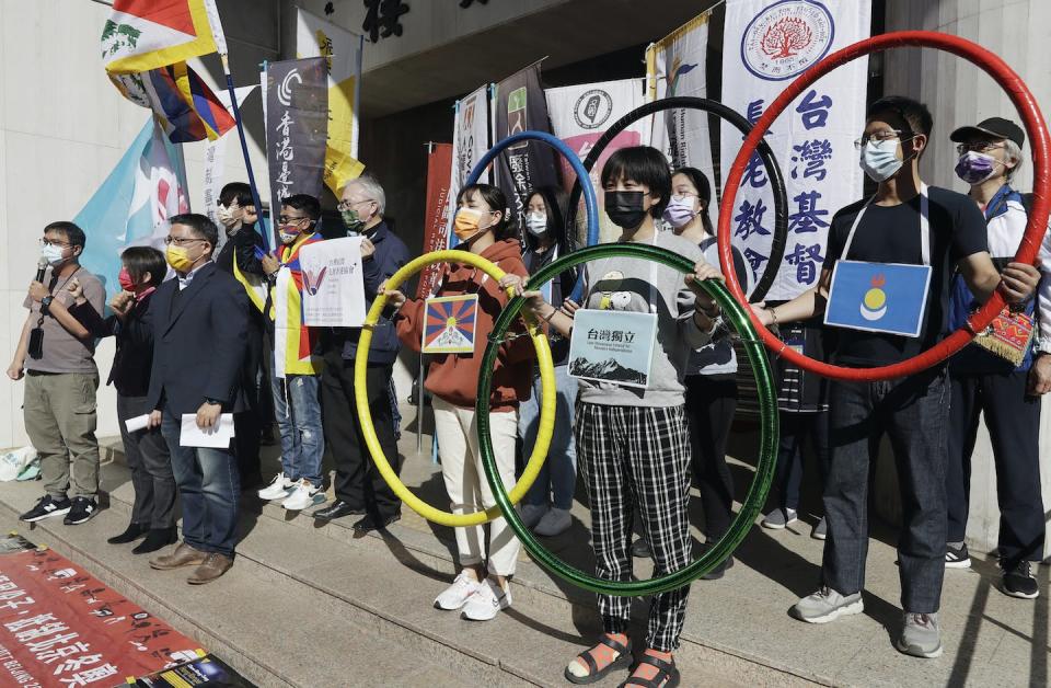 Human rights groups call for the boycott of the Beijing Winter Olympics in Taipei, Taiwan, in January 2022. (AP Photo/Chiang Ying-ying)