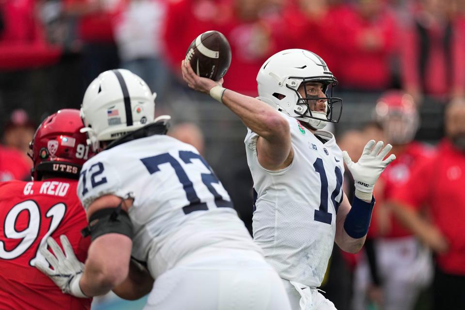 Penn State quarterback Sean Clifford (14) throws a pass during the first half in the Rose Bowl NCAA college football game against Utah Monday, Jan. 2, 2023, in Pasadena, Calif. (AP Photo/Mark J. Terrill)