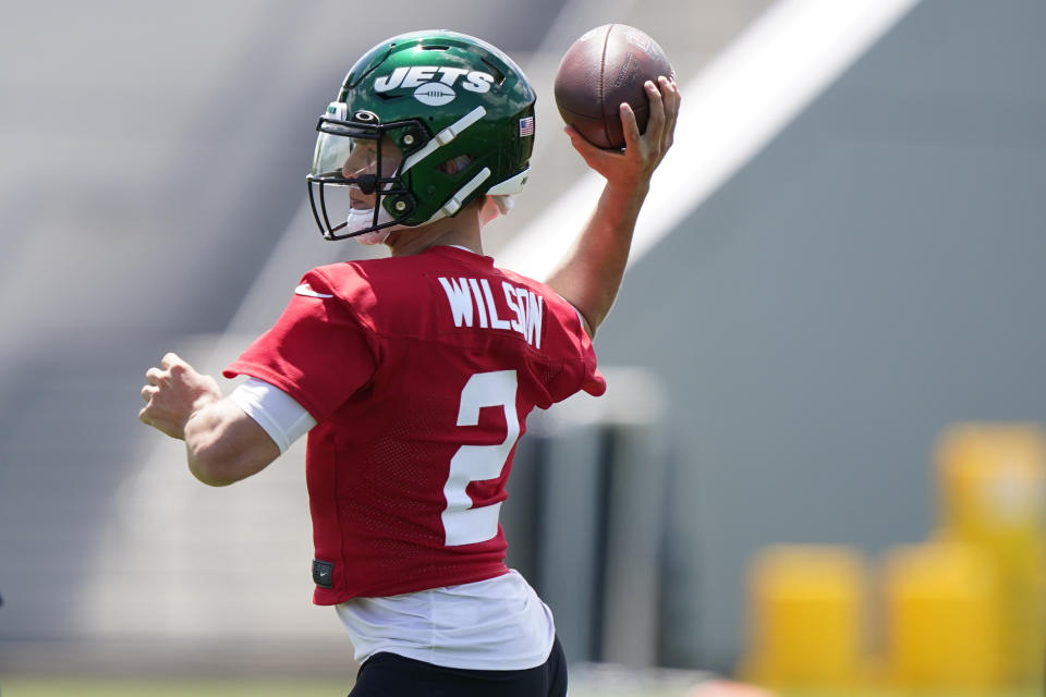 New York Jets quarterback Zach Wilson prepares to pass during an NFL football practice, Thursday, May 27, 2021, in Florham Park, N.J. (AP Photo/Kathy Willens)