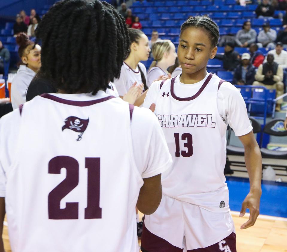 Caravel's Cherish Bryant is introduced with the starters before the DIAA championship at the Bob Carpenter Center, Saturday, March 9, 2024.