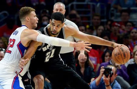 May 2, 2015; Los Angeles, CA, USA; Los Angeles Clippers forward Blake Griffin (32) guards San Antonio Spurs forward Tim Duncan (21) in the first half of game seven of the first round of the NBA Playoffs at Staples Center. Mandatory Credit: Jayne Kamin-Oncea-USA TODAY Sports