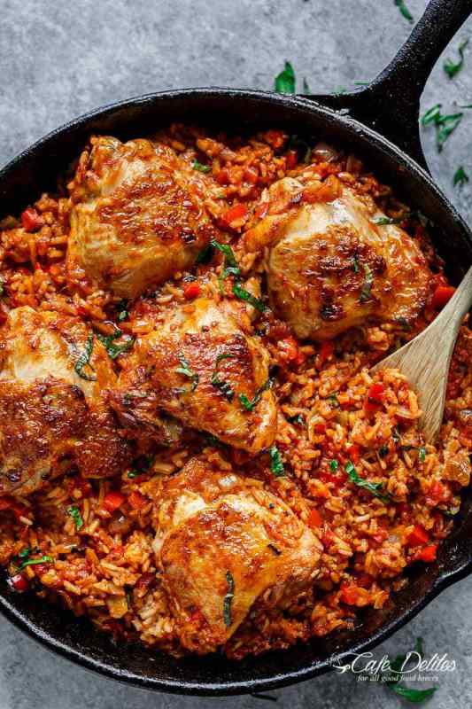 <p>Cafe Delites</p><p>Crispy chicken bakes over a bed of tomato basil rice in this one-pan tomato basil chicken and rice. Dinner is ready in 45 minutes!</p><p><strong>Get the recipe: </strong><a href="https://cafedelites.com/one-pan-tomato-basil-chicken-rice-recipe/" rel="nofollow noopener" target="_blank" data-ylk="slk:One-Pan Tomato Basil Chicken and Rice;elm:context_link;itc:0;sec:content-canvas" class="link "><strong>One-Pan Tomato Basil Chicken and Rice</strong></a></p>