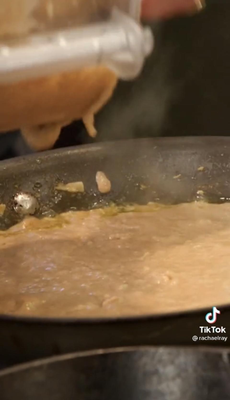 The beans boiling along with the oil