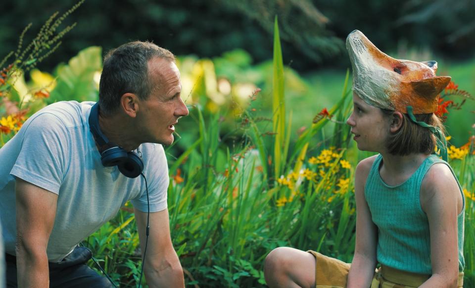 Director Marc Munden and Dixie Egerickx on the set of "The Secret Garden."