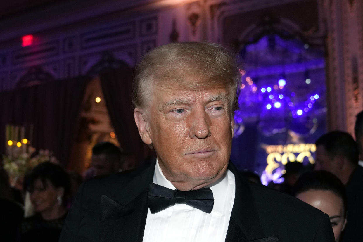 Former President Donald Trump arrives for a New Years Eve party at Mar-a-Lago, in Palm Beach, Fla., Saturday, Dec. 31, 2022. (AP Photo/Lynne Sladky)