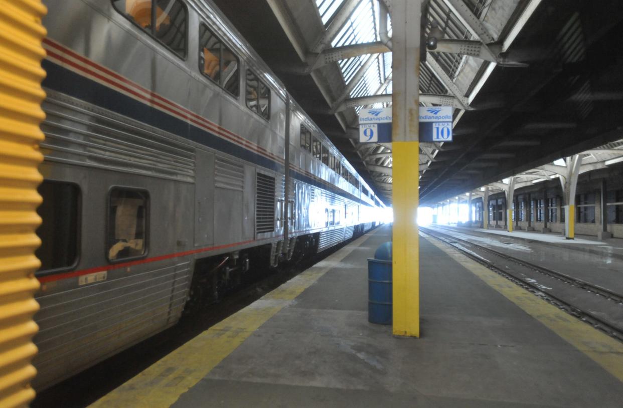 An Amtrak passenger train is parked on the platform at Union Station on Jan. 7, 2014, after it was stopped en route from Cincinnati to Chicago. Indiana officials announced that they couldn’t reach an agreement with Amtrak to save the Hoosier State line, which will end in April 2015.