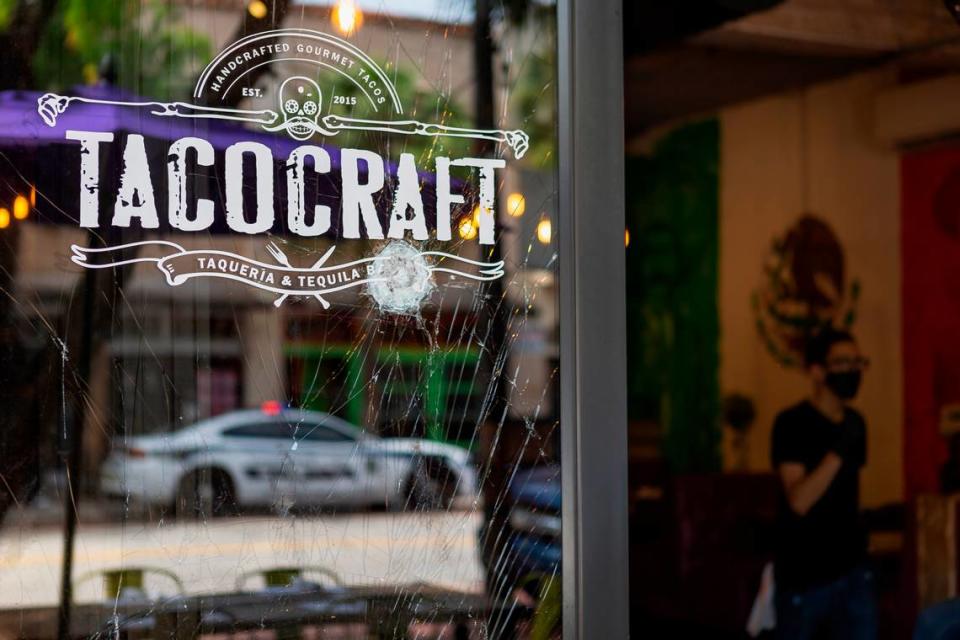 A shattered window can be seen at TacoCraft Taqueria & Tequila Bar in Fort Lauderdale, Florida on Monday, June 1, 2020. A ÔJustice for George FloydÕ protest that took place Sunday started peaceful but devolved into violent confrontations between South Florida police and demonstrators.